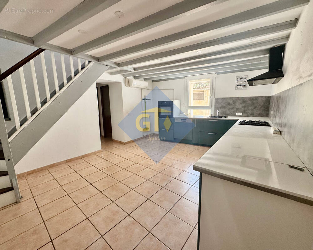 Maison à LAUDUN-L'ARDOISE