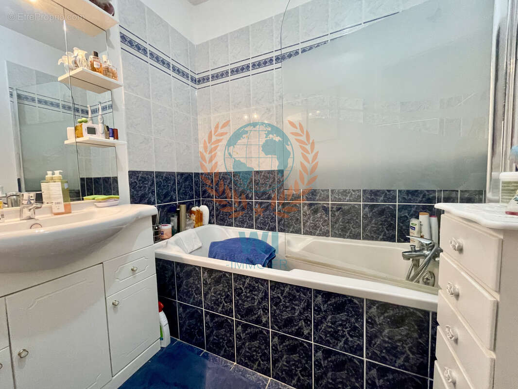 Appartement  en rez-de-jardin avec piscine et garage - photo 6