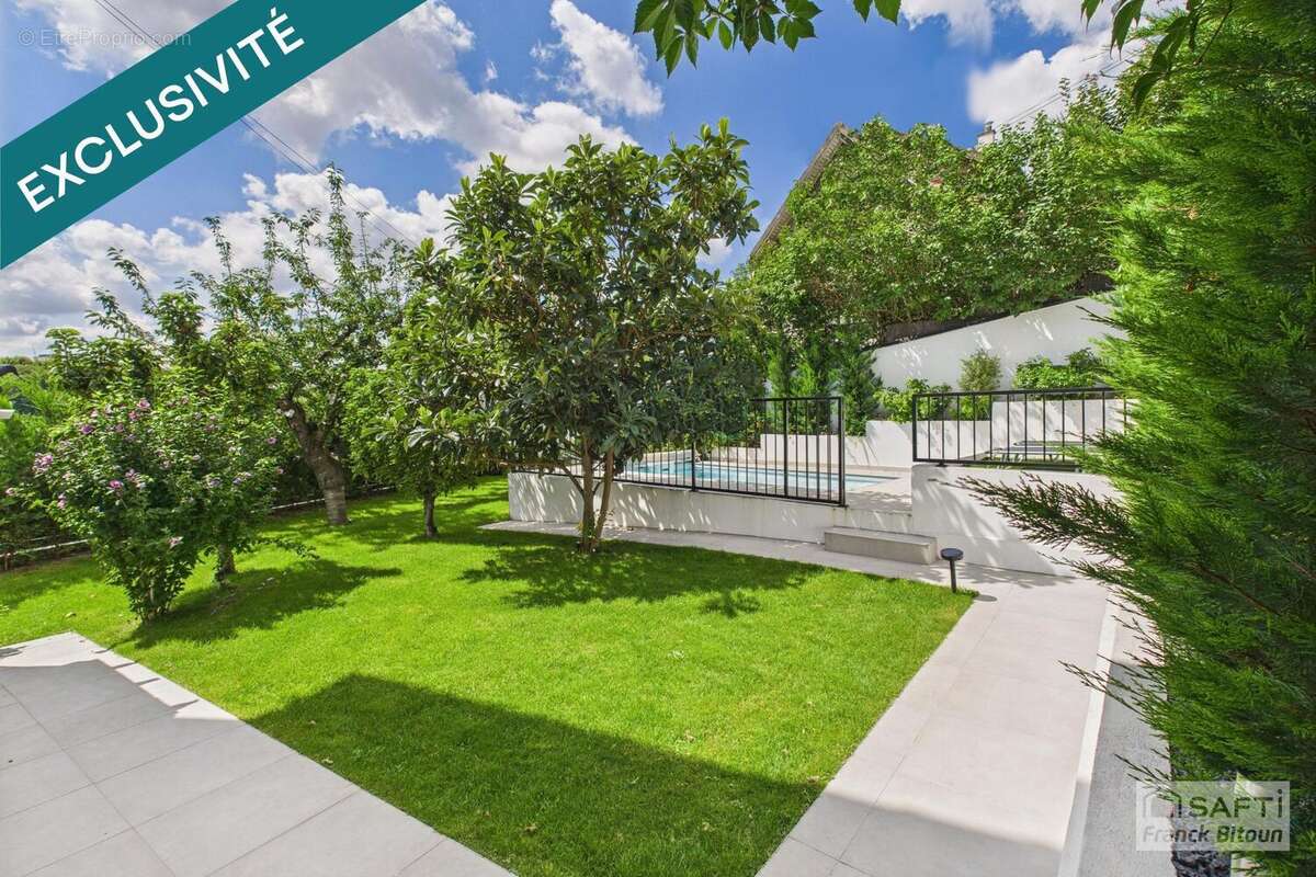 Photo 3 - Maison à COURBEVOIE