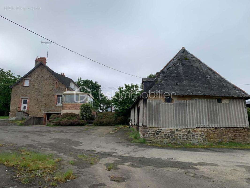 Maison à JUVIGNE