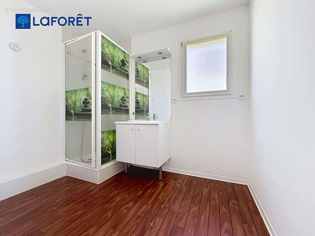 Au Centre de Guidel, Appartement 68m²,  2 chambres, terrasse, jardin, 2 stationnements - photo 10