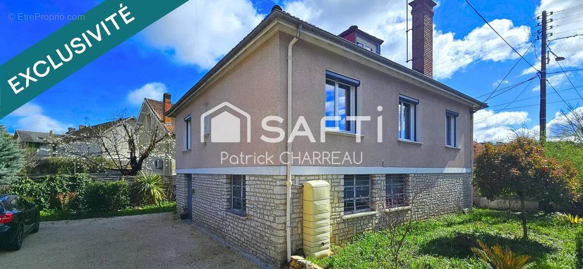 Photo 1 - Maison à TERRASSON-LAVILLEDIEU