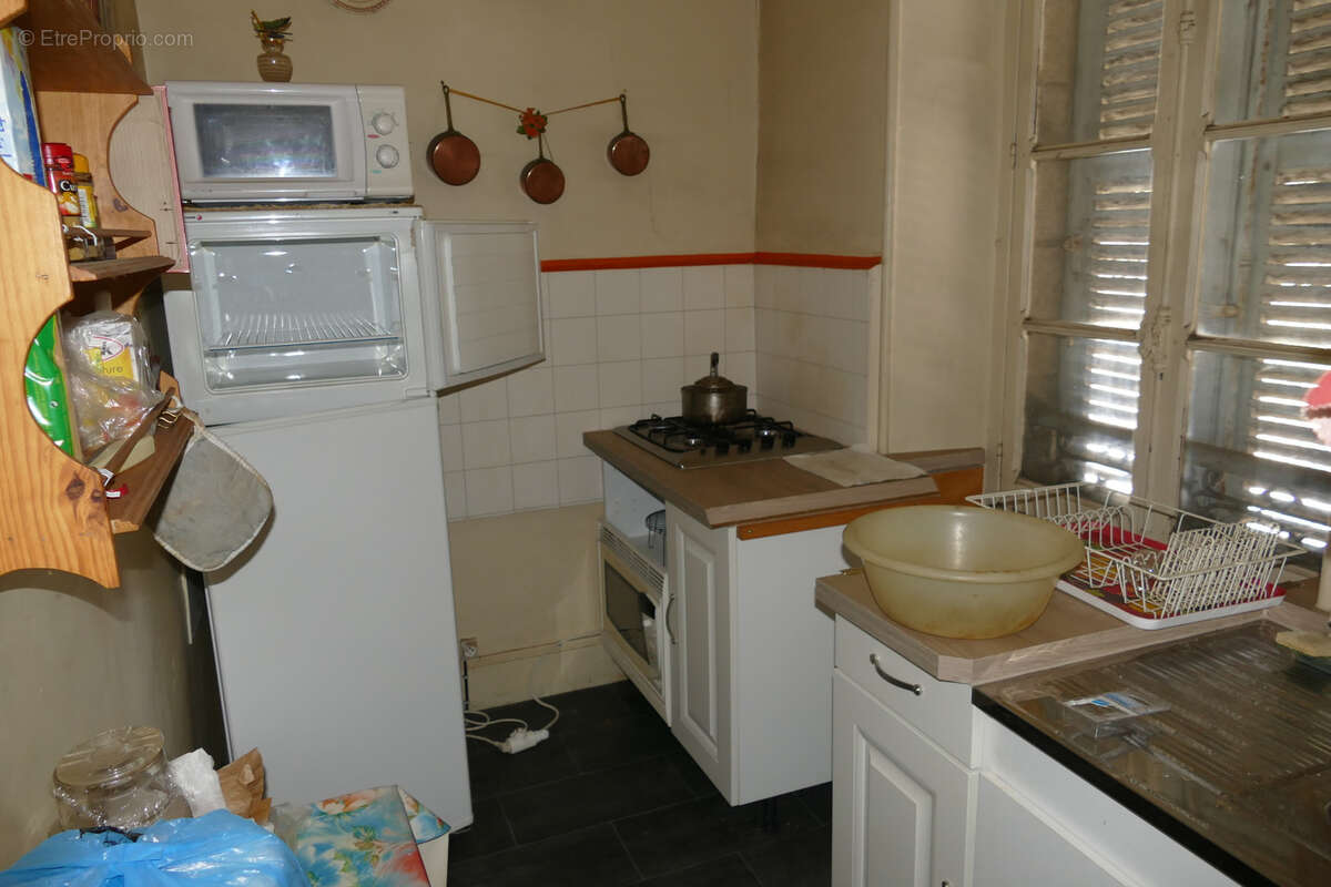 Maison à rénover avec local commercial et logement indépendants (Maurs, 15) - photo 8