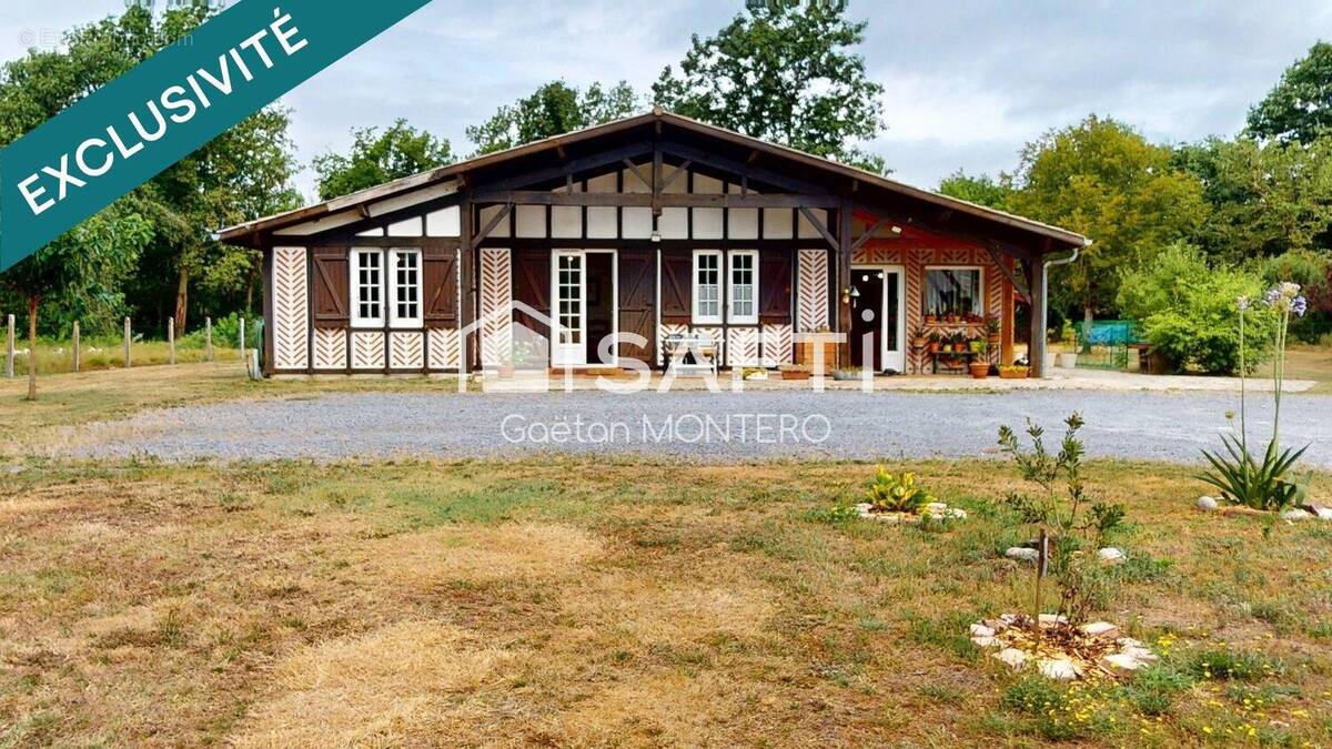 Photo 1 - Maison à LABOUHEYRE