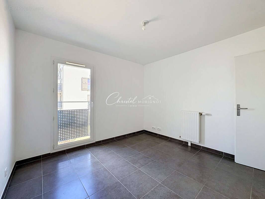 T2 centre bourg chessy de 40.33m2 avec place de parking en sous sol - photo 7