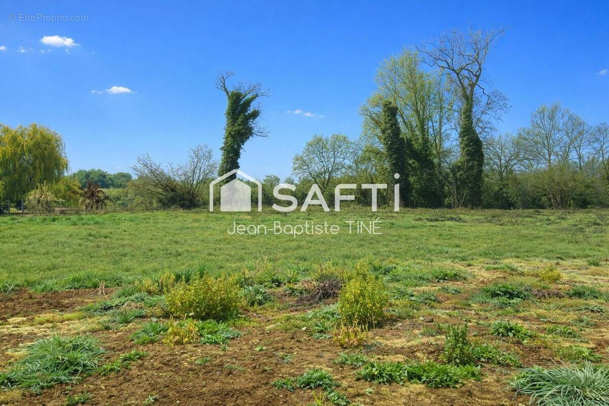 Photo 1 - Terrain à CASTELSARRASIN