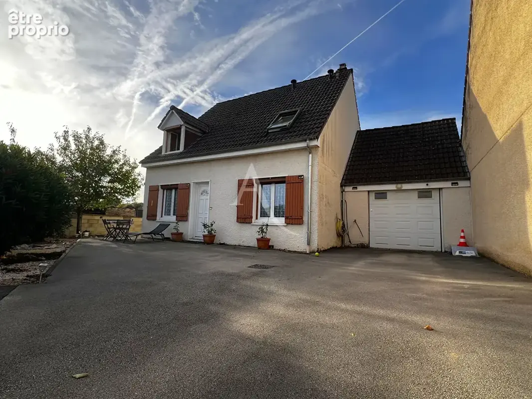 Maison de 108 m² avec 4 chambres, garage et cave - Lux - photo 2