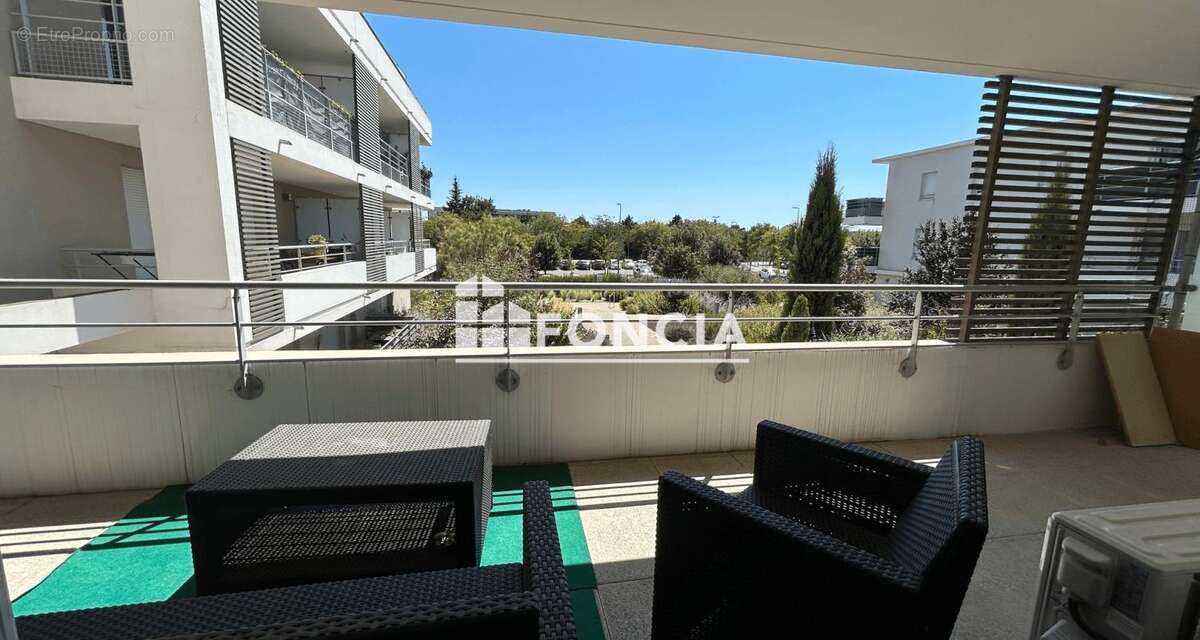 Appartement de type 3 dans une résidence sécurisée avec place de parking - photo 2
