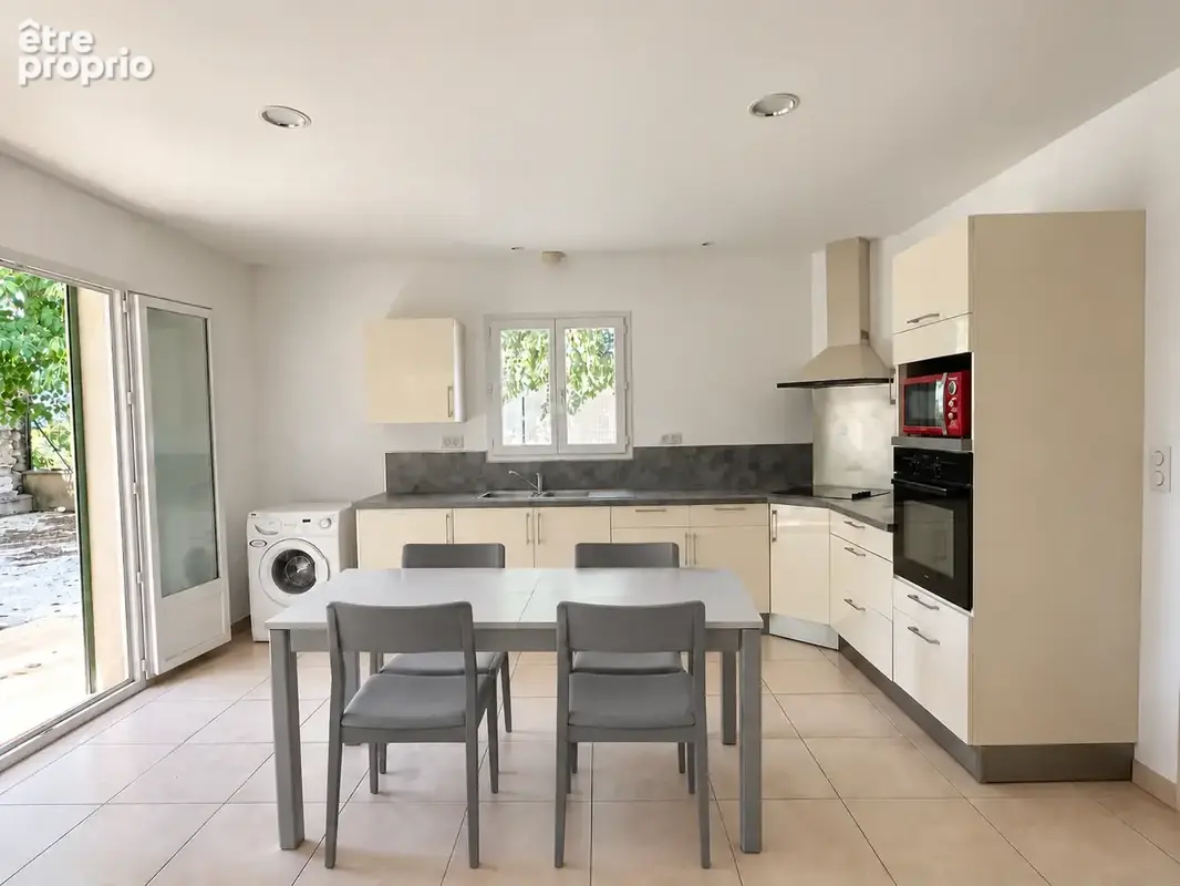 Vente maison plain-pied 111m2 sur 600m2 de terrain - photo 4