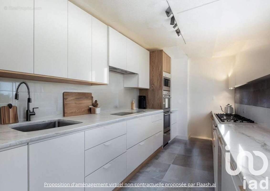 Photo 5 - Appartement à SAINT-GENIS-LES-OLLIERES