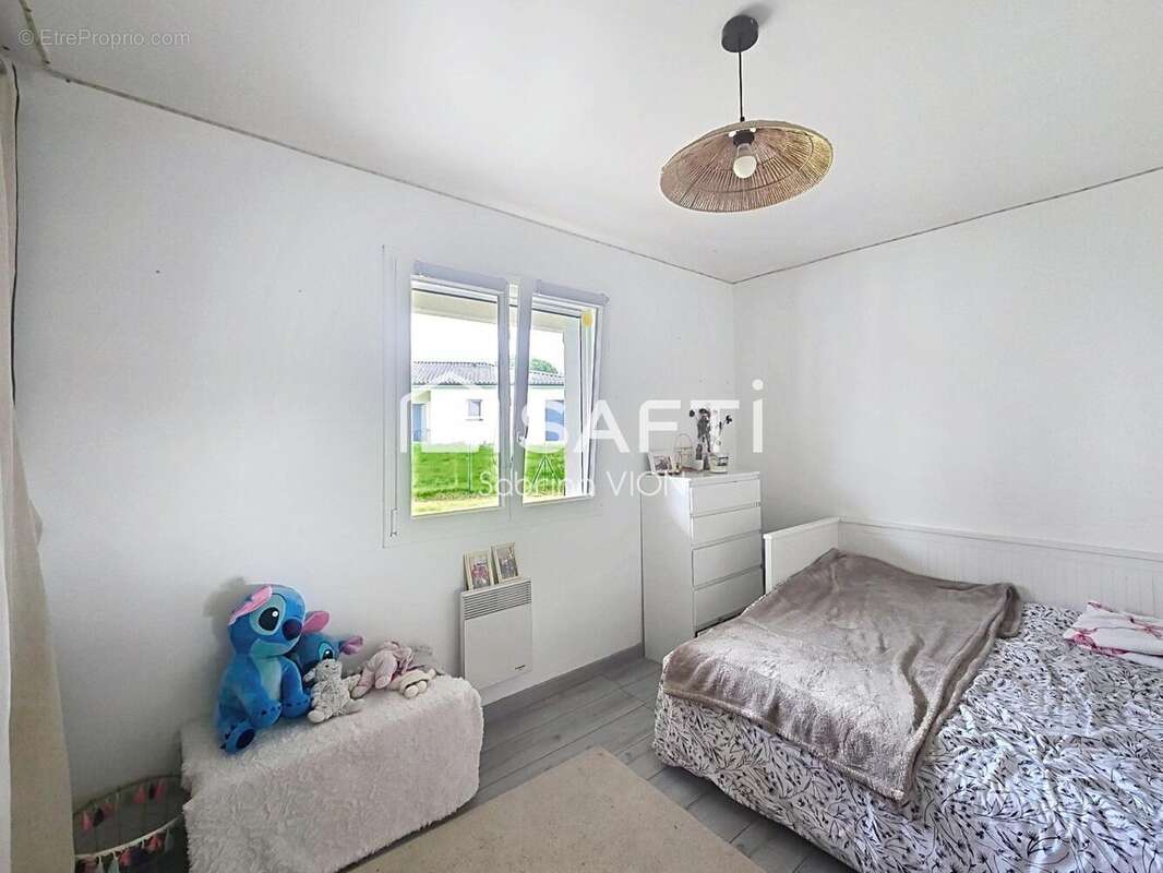 Photo 5 - Maison à SAINT-ETIENNE-DE-TULMONT