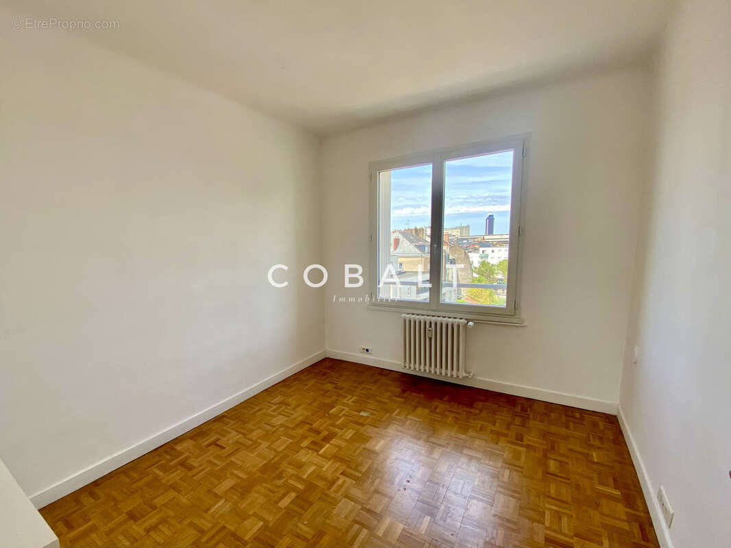 Appartement T4 spacieux avec balcon & vue dégagée - photo 5