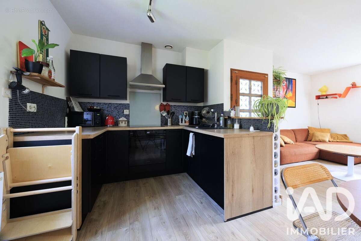 Photo 4 - Appartement à SAINT-GENIS-LES-OLLIERES