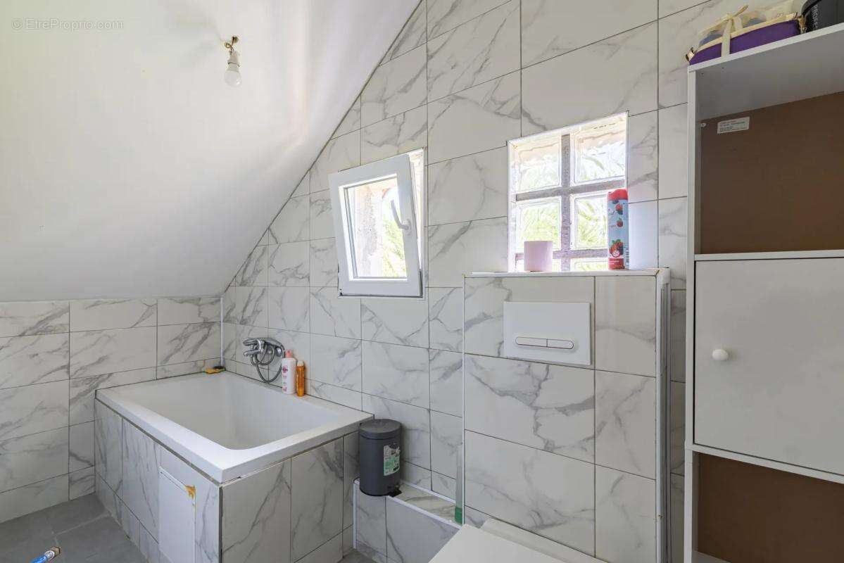 Maison de 7 pièces de 120 m² à Saint-Brice-sous-Forêt - photo 12