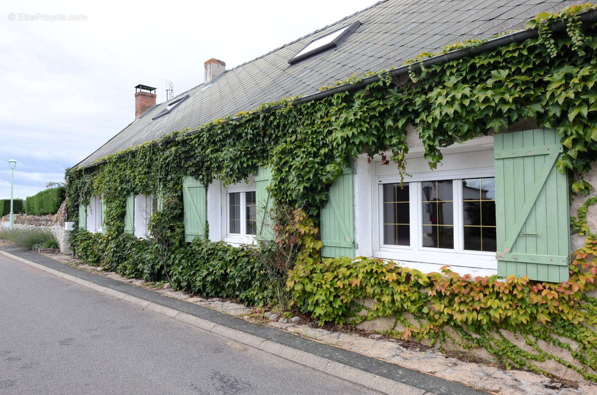 Maison à CURDIN