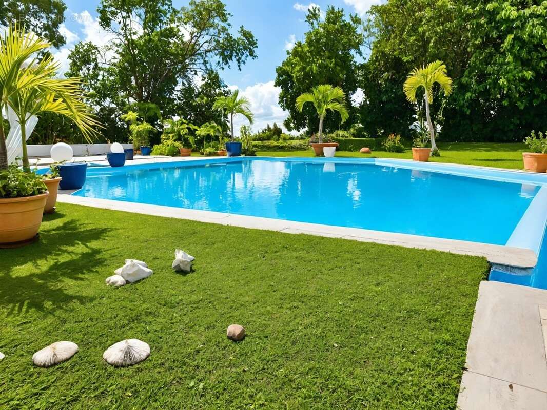Villa d'exception de plain-pied 6 pièces, avec piscine, vue montagne – Le Gosier LE GOSIER (971) - photo 2