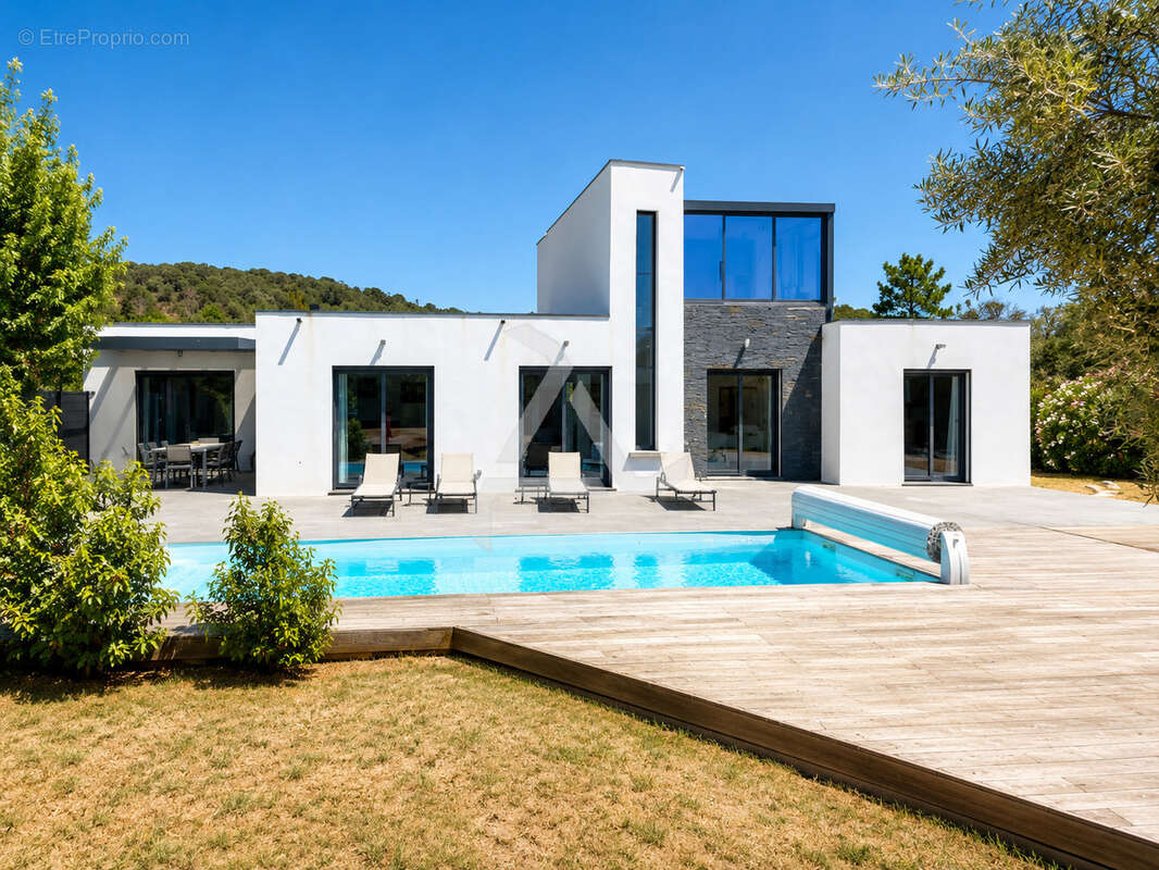 Villa t7 de 211m2 contemporaine avec piscine sous-sol aménagé et chambre indépendante - photo 3