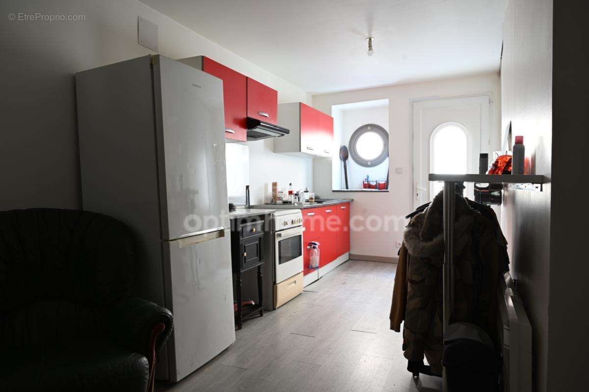 Maison en pierre avec deux logements, terrasse panoramique et potentiel exceptionnel à DOUZILLAC (24) - photo 4