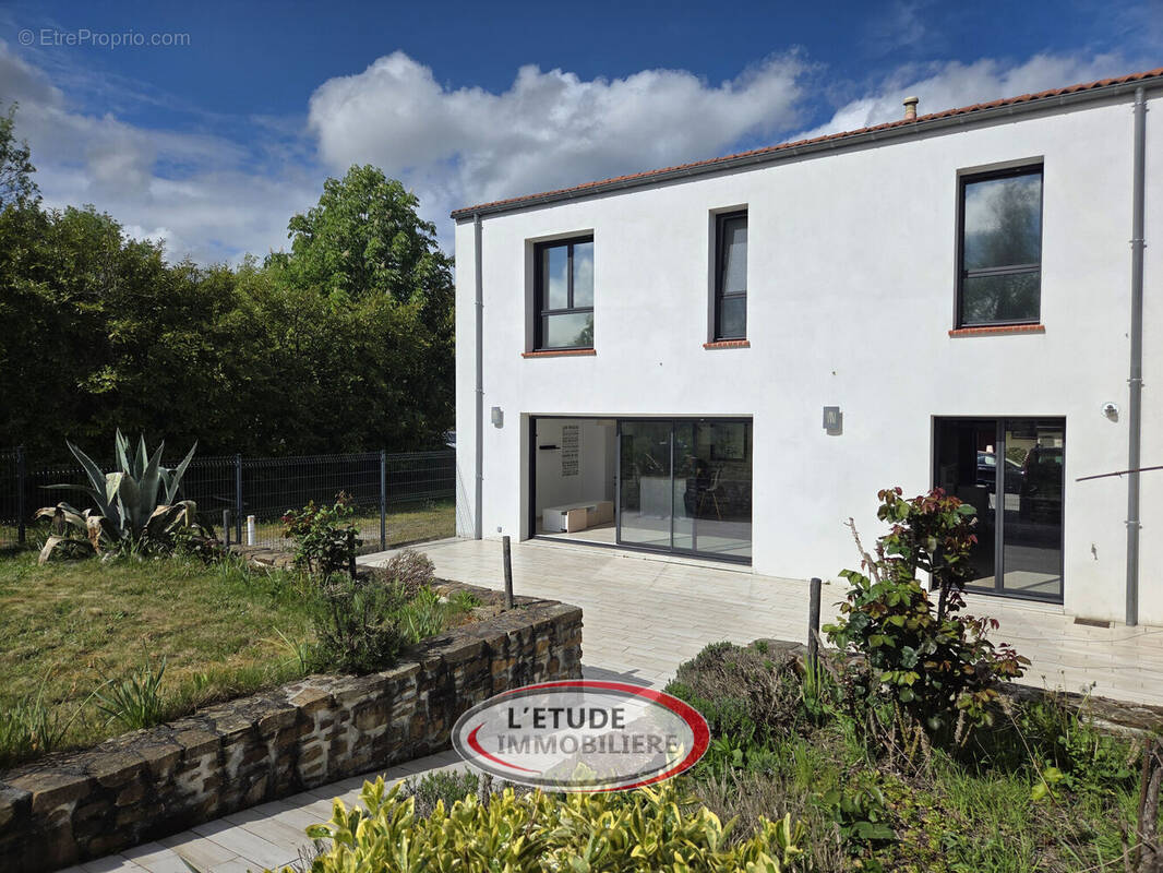 Photo 1 - Maison à BOUGUENAIS