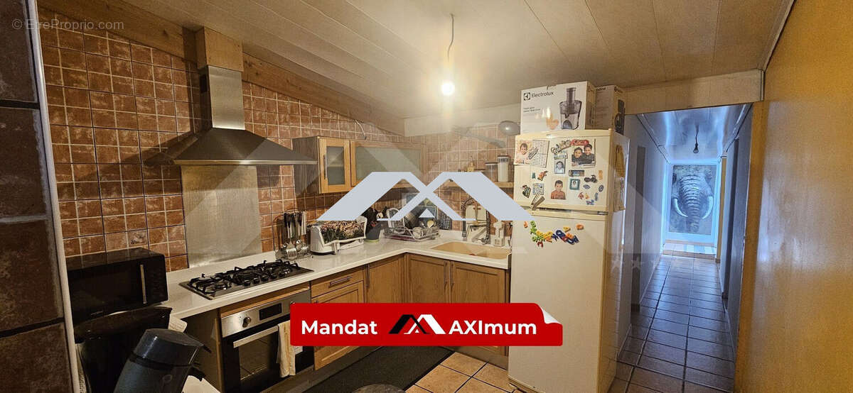 Maison 100 m² à Saint-Denis  - photo 3