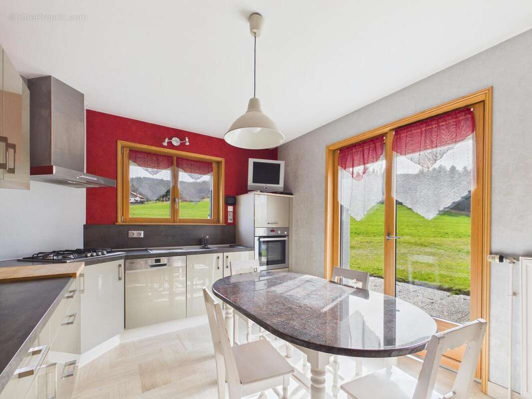 Photo 2 - Maison à LE SYNDICAT