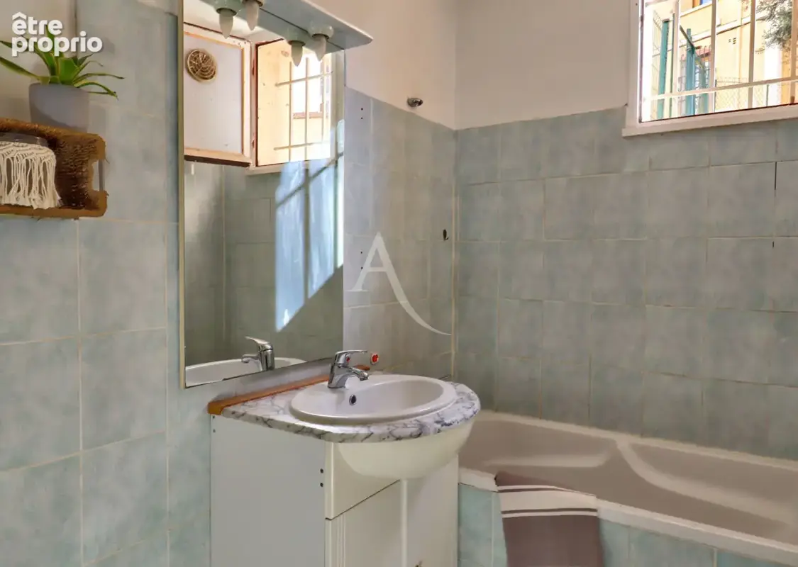 Appartement avec balcon cave et ascenseur proche centre ville - photo 6
