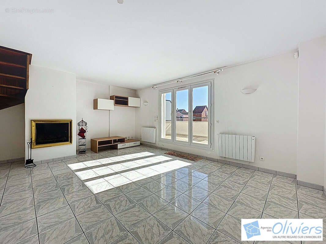 Appartement à VOISINS-LE-BRETONNEUX