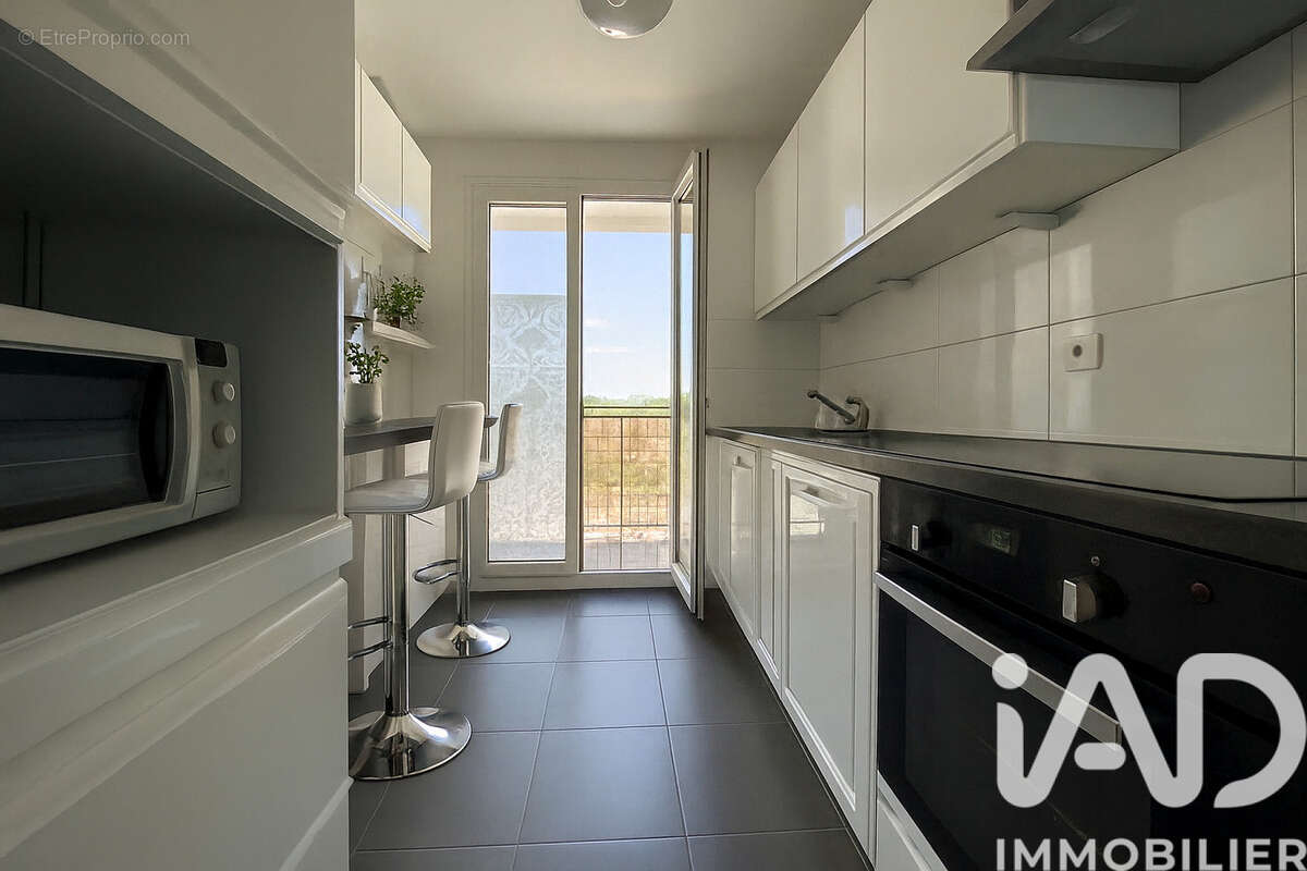 Photo 9 - Appartement à BAILLY-ROMAINVILLIERS