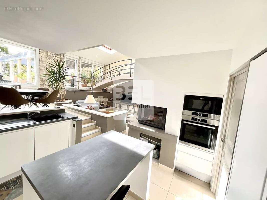 Maison à LAUDUN-L&#039;ARDOISE