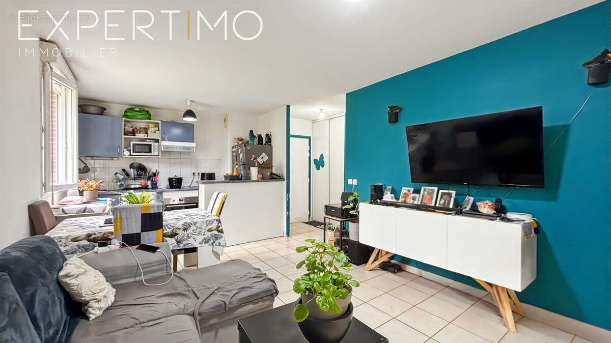 À vendre appartement F3 RDC avec terrasse et deux places de stationnement - photo 3