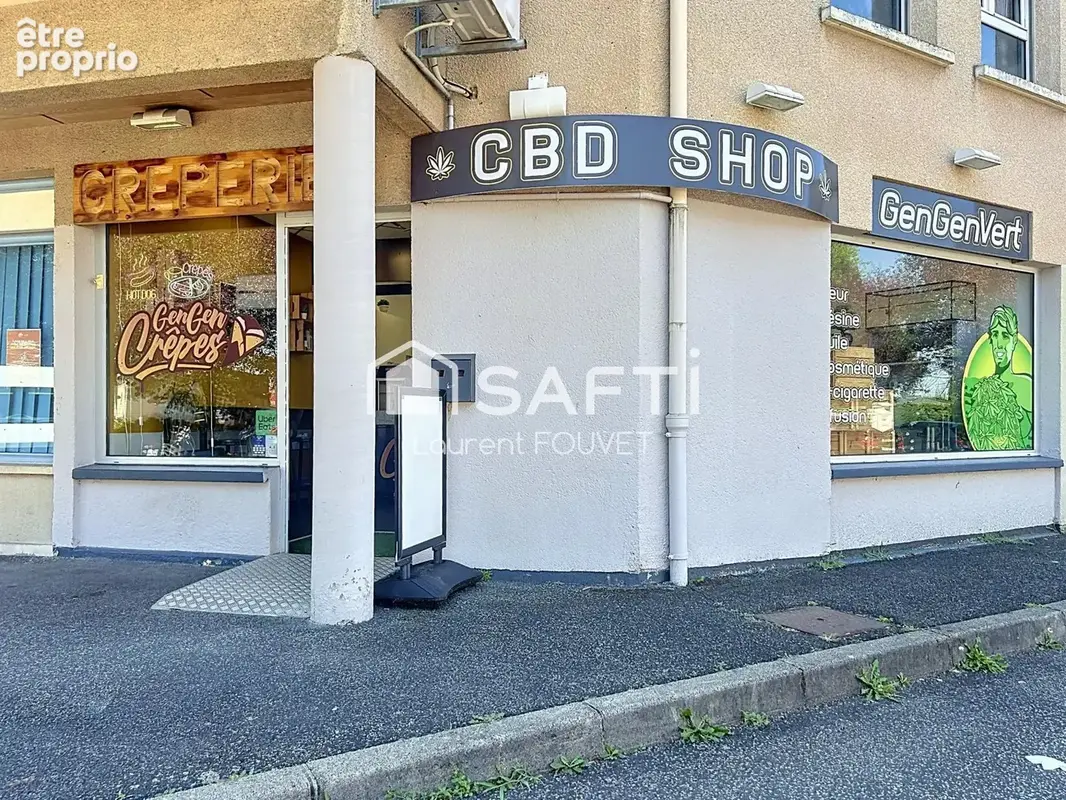 Photo 1 - Commerce à VEAUCHE