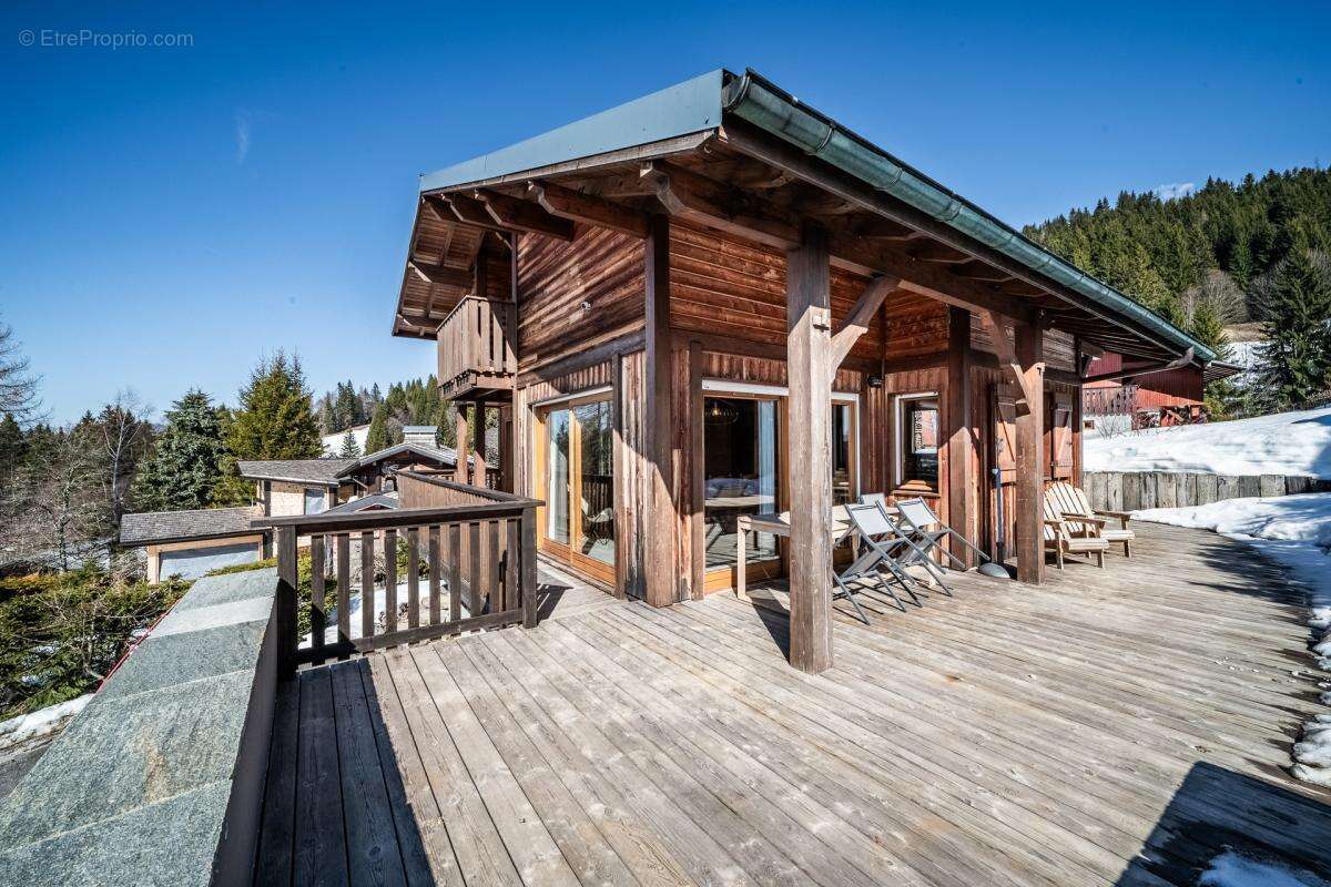 Un chalet alpin magnifiquement aménagé offrant une vue panoramique, idéalement situé à Chavannes - photo 21