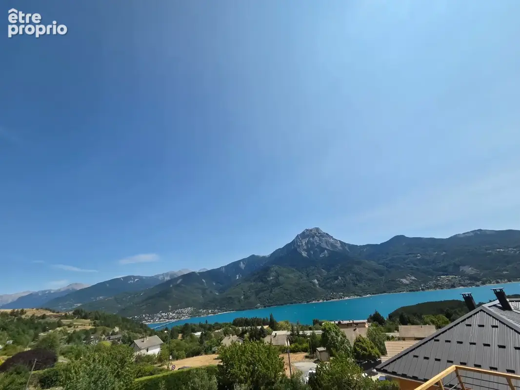 Appartement à vendre 4 pièces ,vue  Lac et Montagnes sur SAVINES LE LAC (05) , Dans une résidence en construction style villa  p - photo 2