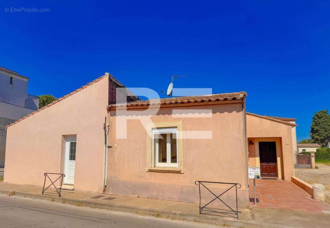 Maison de plainpied avec terrasse, jardinet & garage - photo 3