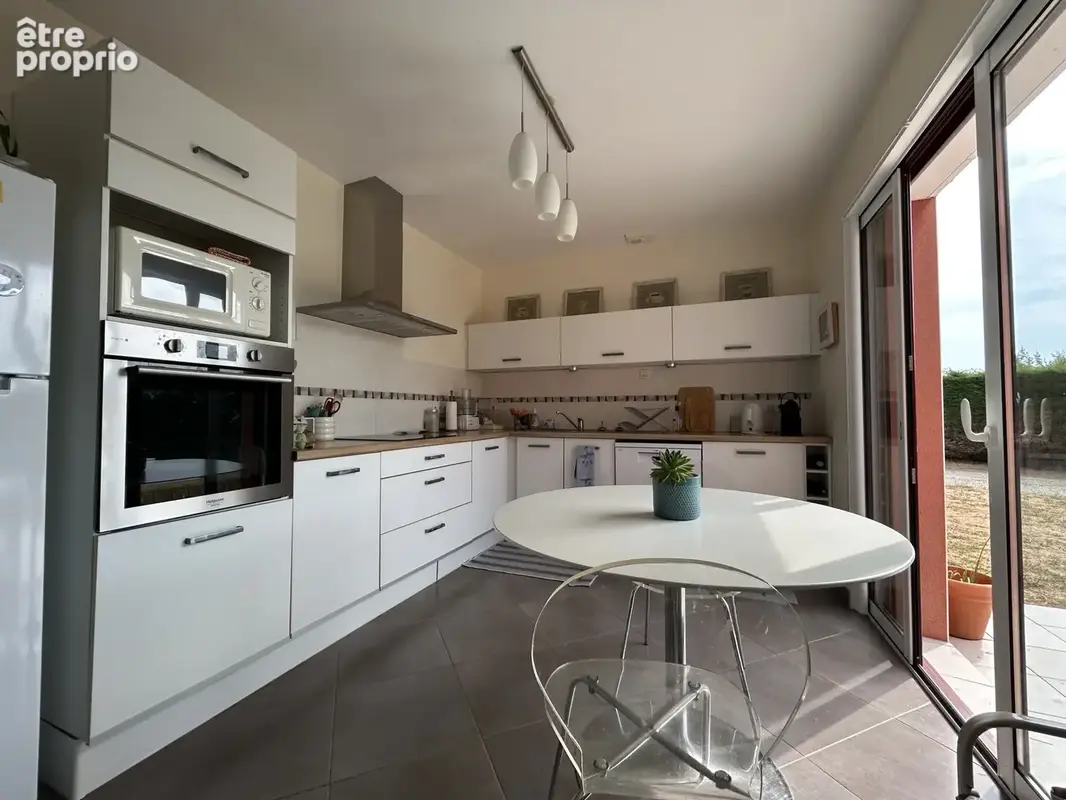 Maison - 100 m2 - 4 pièces - photo 2