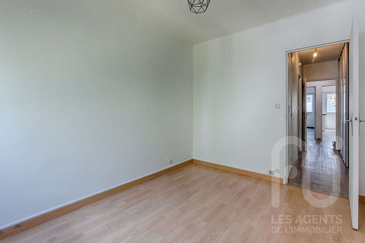 3 pièces 61 m² avec cave et parking Résidence semi-récente - photo 9