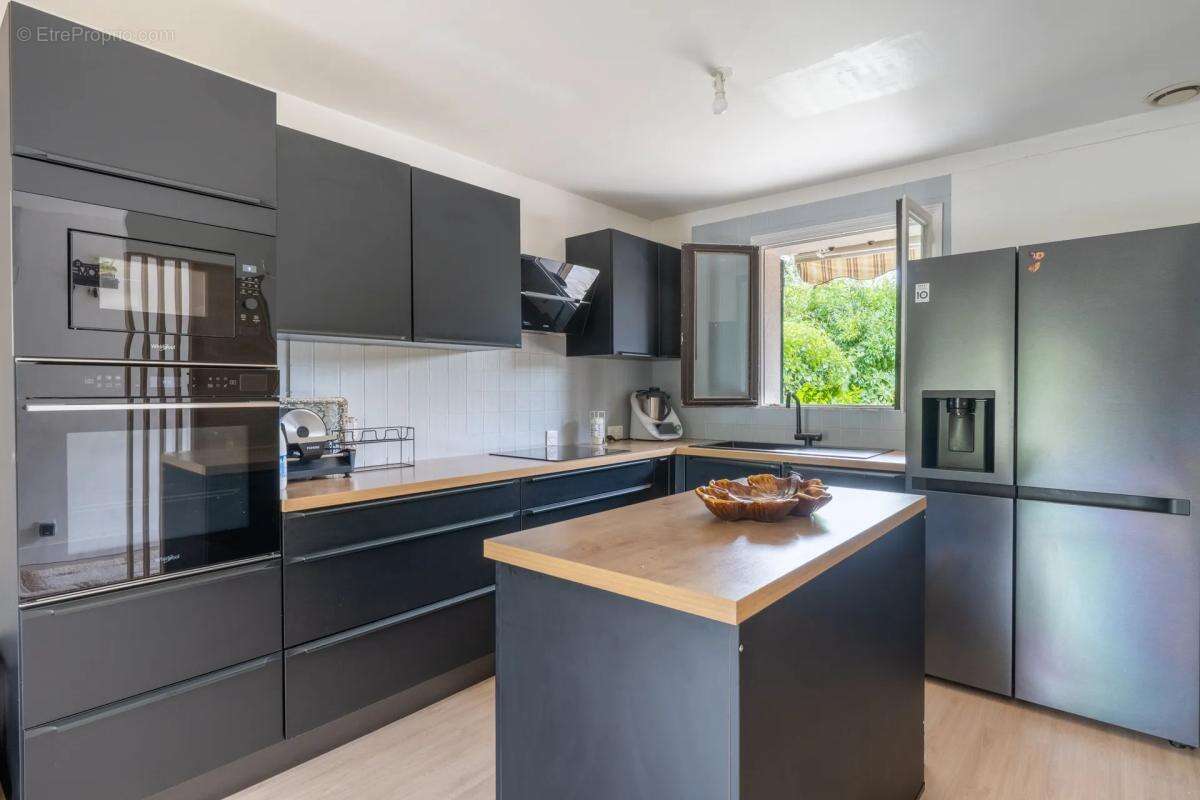 Maison de 6 pièces de 100 m² à Ézy-sur-Eure - photo 8