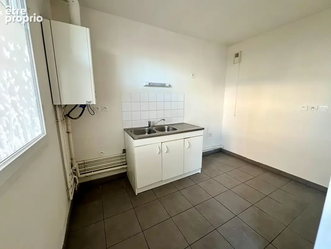 Appartement  T2 avec terrasse et parking - photo 3