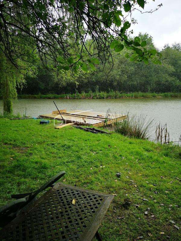 pavillon avec vie de plain pied avec terrain et plan d'eau ! - photo 15