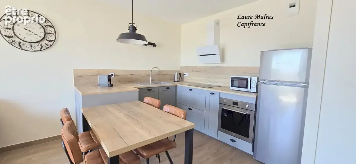 GROISY – A vendre beau T2 avec balcon, vue montagnes, cave, 2 stationnements privatifs - photo 3