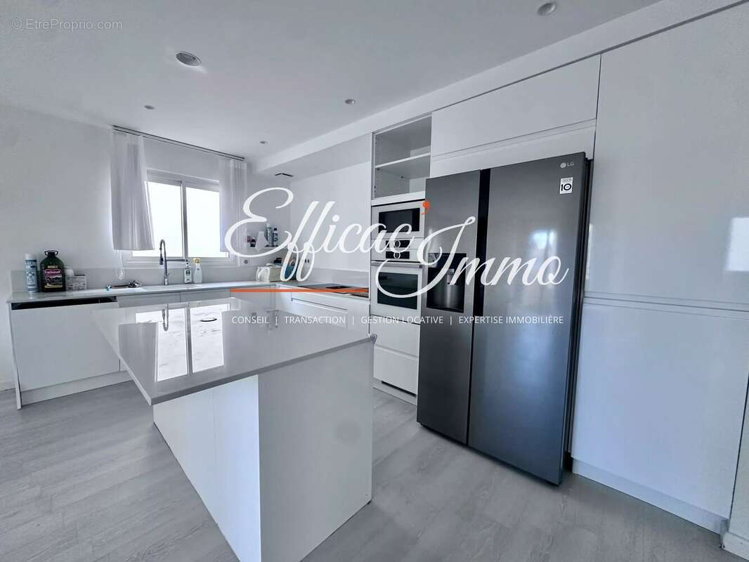 Bien à usage mixte de 154,51 m² avec garage, jardin et prestations haut de gamme - photo 5