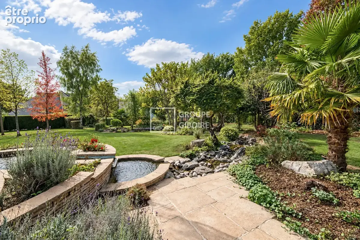 A VENDRE - Agence GIBOIRE de Bruz - Exclusivité - Maison d'architecte de 200 m² au coeur d'un parc paysager de 4 500 m² - Saint  - photo 12