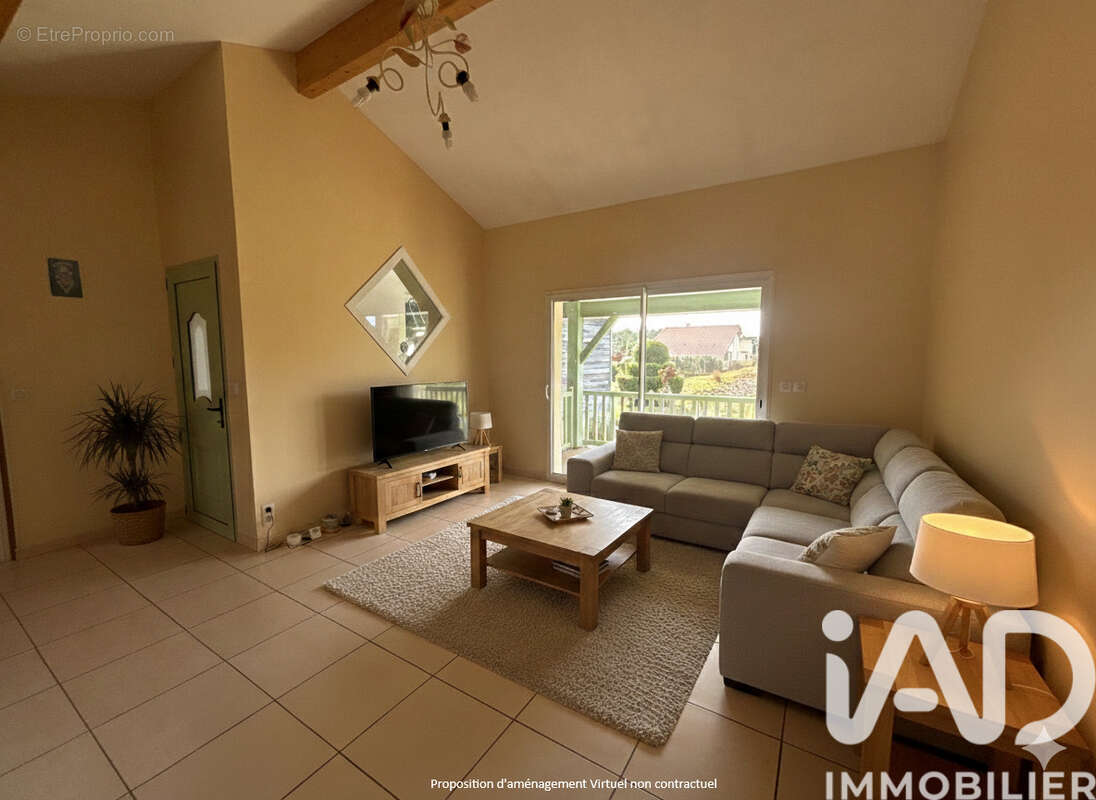 Photo 2 - Maison à SAINT-JULIEN-EN-BORN