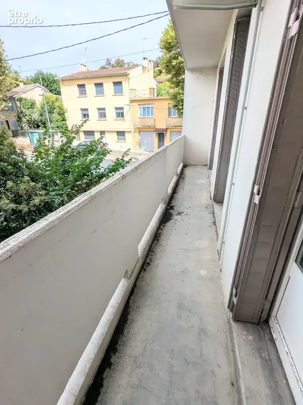 Appartement T4 rénové avec balcon en centre-ville d’Auch - photo 4