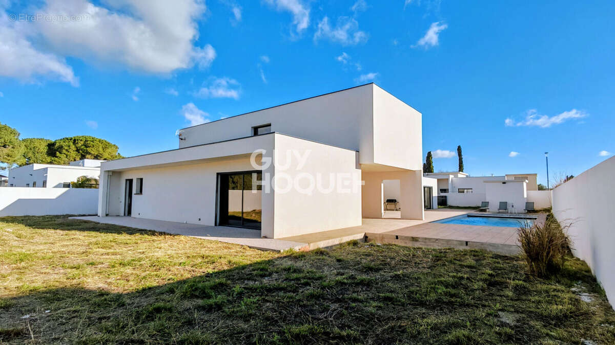 Villa contemporaine, 227 m² - 4 suites - Piscine - EN EXCLUSIVITE . A vendre Perpignan (66000) Parc Ducup - Environnement calme  - photo 11