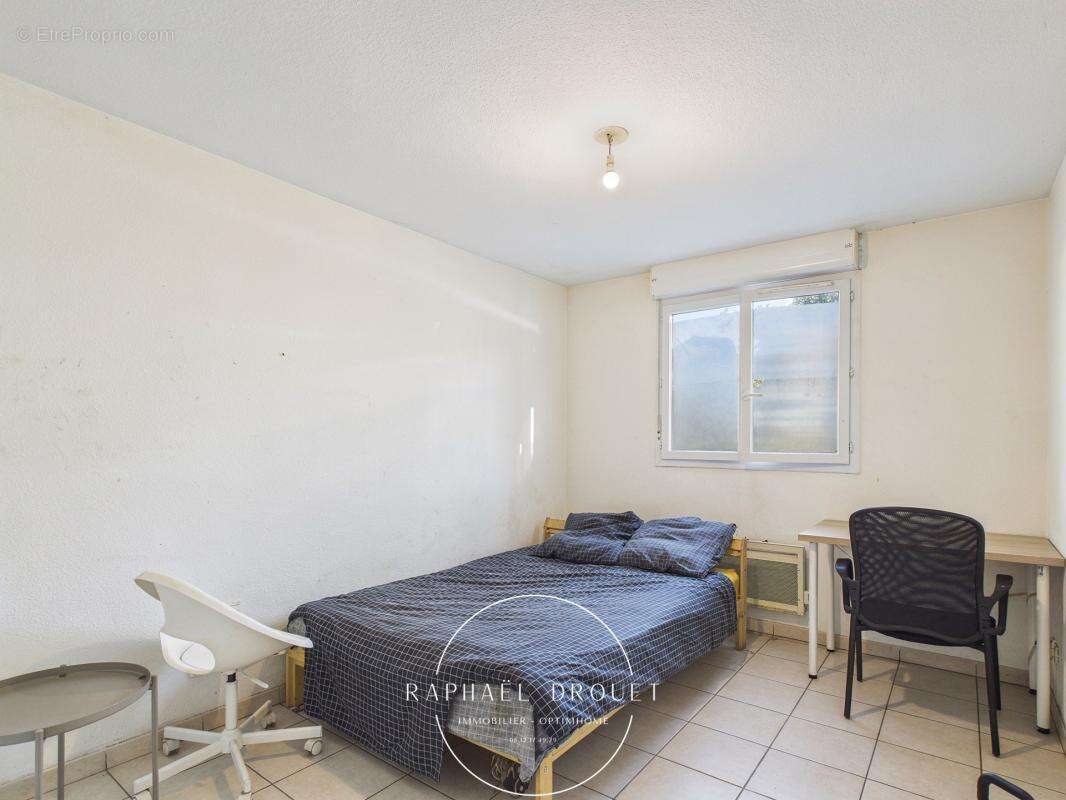 T3 avec terrasse et parking – Investissement locatif sécurisé à Grigny (69520) - photo 7