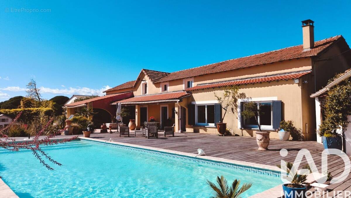 Photo 1 - Maison à SAINT-LAURENT-D'AIGOUZE