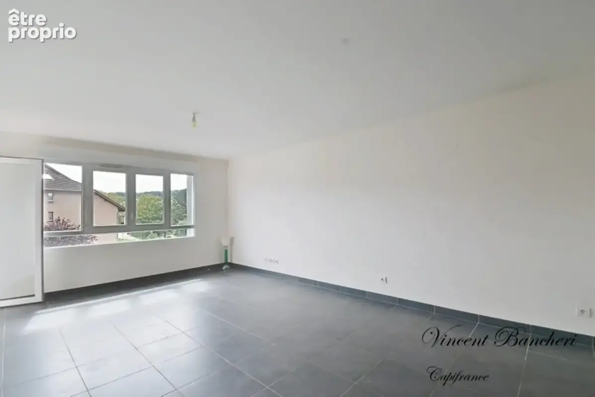Appartement à vendre 3 pièces REIGNIER (74) avec Terrasse, 2 places de parkings et cave - photo 4