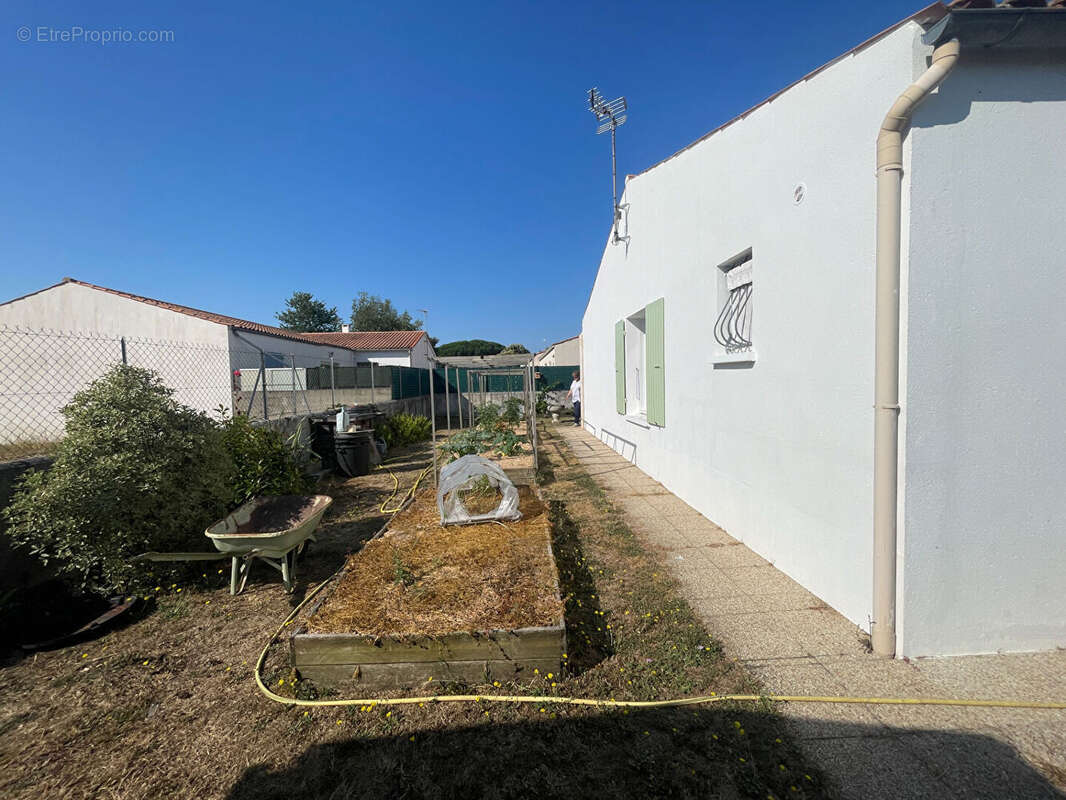 Maison 3 chambres avec véranda, garage et terrain de 578 m²  - Environnement calme - photo 3