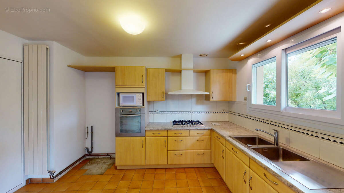 Maison de plain pied dans quartier recherché (Clairbois) - photo 3